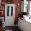 Photo 5: The kitchen is big, with a dishwasher, and each tenant has half the fridge that you can see here.