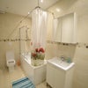Photo 4: The other bathroom with the shower over the bath so you get the benefit of having both