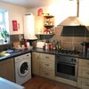 Photo 6: dedicated storage for you in the large kitchen 