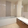 Photo 7: En-suite bathroom. with bath and shower over