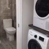 Photo 7: Washing machine and dryer 