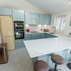 Photo 1: KITCHEN AND BREAKFAST BAR