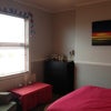 Photo 3: Double Room Front View 