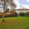 Photo 8: Communal gardens with free parking to the left. This is the view from the bedroom window