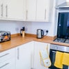 Photo 8: Communal kitchen in property with all mod cons