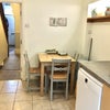 Photo 8: Kitchen / dining room with all appliances including dishwasher & tumble drier