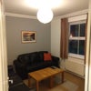 Photo 3: Separate sitting room with TV