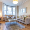 Photo 5: Sofa Area