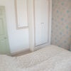 Photo 2: Room 1 with large built in wardrobe (smaller double room)