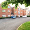 Photo 9: parking lot and block of flats