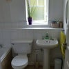 Photo 7: Bathroom with electric shower over bath