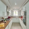 Photo 5: Large kitchen with plenty of storage
