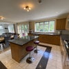 Photo 4: Kitchen side on (we have more breakfast bar chairs) boasting massive cooking space