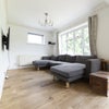 Photo 3: Opposite the kitchen (open plan) - massive sofa with fantastic 65inch TV