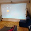 Photo 3: Spacious lounge with projector home cinema