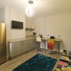 Photo 3: Modern Living Area