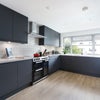 Photo 3: Very cool, contemporary kitchen with plenty of prep space and big range cooker