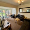 Photo 2: Living room opens to garden