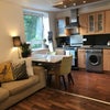 Photo 3: Shared kitchen and living space 
