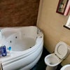 Photo 3: Large corner bath