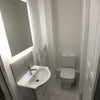 Photo 5: Shaver socket on mirror edge. Soft close toilet.