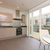 Photo 6: Kitchen and patio 