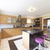 Photo 7: Kitchen side on (we have more breakfast bar chairs) boasting massive cooking space
