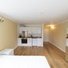 Photo 2: The other side of the room demonstrating kitchen annex
