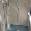Photo 2: Shower and Toilet