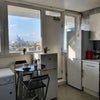 Photo 1: Kitchen and Balcony 