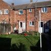 Photo 5: Back garden with shed and outdoor cupboards.  With patio dining area