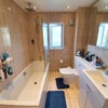 Photo 4: The shared bathroom