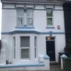 Photo 4: Front of house 