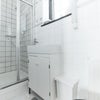 Photo 3: One of two main bathrooms which have good water pressure 