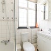 Photo 4: Second shared bathroom with a shower over the bath