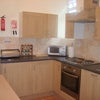 Photo 5:  Fully Equipped Kitchen with Plenty Cupboard Space