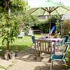 Photo 2: The Garden - with BBQ area