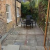 Photo 4: Patio garden with table & chairs