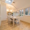 Photo 5: The dining table, nice and bright overlooking the garden