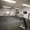 Photo 8: Gym area. There is also a gym studio where classes can be broadcast to a large TV