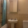 Photo 6: Bathroom with power shower over bath