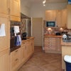 Photo 5: Fully equipped kitchen with 2 fridge freezers, there's also a separate utility room with mod cons