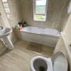 Photo 5: Shared bathroom first floor