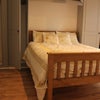 Photo 2: Bedroom 1 - with storage doors open