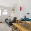Photo 5: Living room - chill area with large flat screen TV and access to garden
