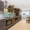 Photo 4: Kitchen - view to living room & garden