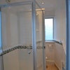 Photo 7: Bathroom with shower
