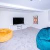 Photo 2: Basement Cinema with Beer fridge 