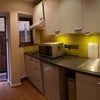 Photo 2: Kitchen and entrance