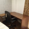 Photo 4: Desk and chair in room